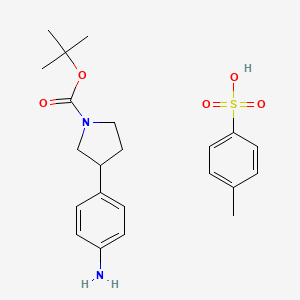 3-(4-Amino-phenyl)-pyrrolidine-1-carboxylic acid tert-butyl ester tosylate - 2097068-76-1