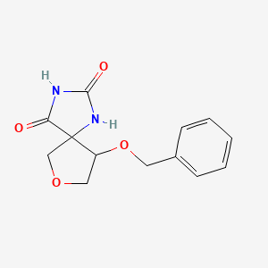 9-(benzyloxy)-7-oxa-1,3-diazaspiro[4.4]nonane-2,4-dione - 2549021-52-3
