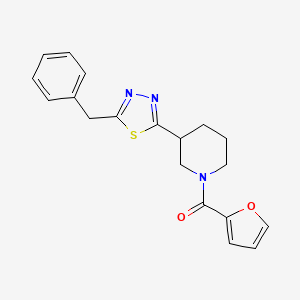 3-(5-benzyl-1,3,4-thiadiazol-2-yl)-1-(furan-2-carbonyl)piperidine - 1203325-65-8