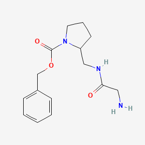 2-[(2-Amino-acetylamino)-methyl]-pyrrolidine-1-carboxylic acid benzyl ester - 