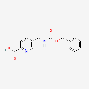 5-(([(Benzyloxy)carbonyl]amino)methyl)pyridine-2-carboxylic acid - 