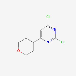 2,4-Dichloro-6-(tetrahydro-2H-pyran-4-yl)pyrimidine - 