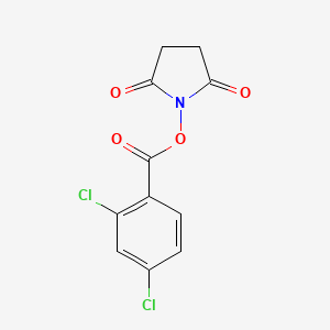 1-{[(2,4-Dichlorophenyl)carbonyl]oxy}pyrrolidine-2,5-dione - 