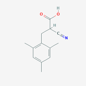 2-Cyano-3-(2,4,6-trimethylphenyl)propionic Acid - 2044707-18-6