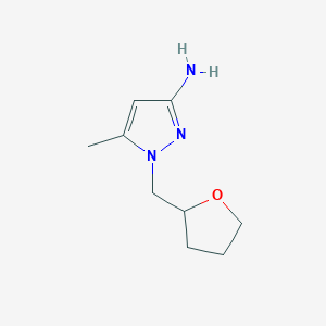 5-Methyl-1-[(oxolan-2-yl)methyl]-1H-pyrazol-3-amine - 