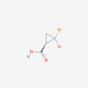 (1S)-2,2-Dibromocyclopropane-1-carboxylic acid - 