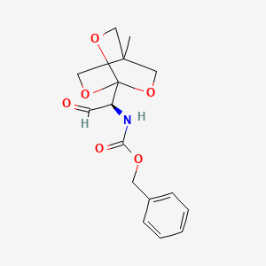 (S)-Benzyl (1-(4-methyl-2,6,7-trioxabicyclo[2.2.2]octan-1-YL)-2-oxoethyl)carbamate - 