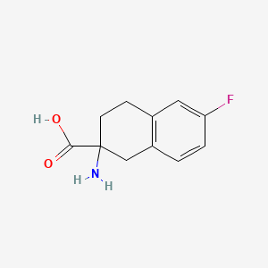 2-Amino-6-fluoro-1,2,3,4-tetrahydronaphthalene-2-carboxylic acid - 885274-22-6