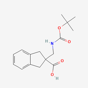 2-Bocaminomethyl-indan-2-carboxylic acid - 1360547-53-0