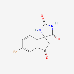 5'-Bromospiro[imidazolidine-4,1'-[1H]indene]-2,3',5(2'H)-trione - 1889290-24-7