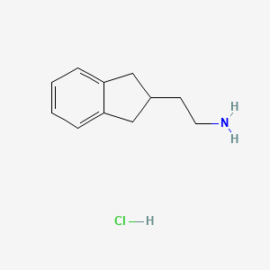 2-(2,3-dihydro-1H-inden-2-yl)ethan-1-amine hydrochloride - 1803570-92-4