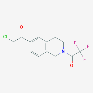 1-[6-(2-Chloroacetyl)-1,2,3,4-tetrahydroisoquinolin-2-yl]-2,2,2-trifluoroethan-1-one - 1803611-75-7