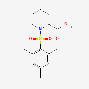 1-(Mesitylsulfonyl)piperidine-2-carboxylic acid - 380222-32-2