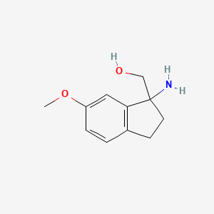 (1-Amino-6-methoxy-2,3-dihydro-1H-inden-1-YL)methanol - 1521074-74-7