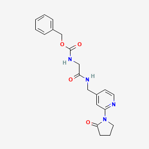 Benzyl (2-oxo-2-(((2-(2-oxopyrrolidin-1-yl)pyridin-4-yl)methyl)amino)ethyl)carbamate - 2034388-78-6