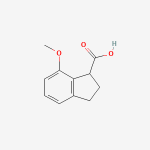 7-Methoxy-2,3-dihydro-1H-indene-1-carboxylic acid - 105211-00-5