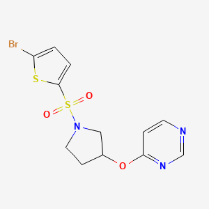 4-((1-((5-Bromothiophen-2-yl)sulfonyl)pyrrolidin-3-yl)oxy)pyrimidine - 2034247-16-8