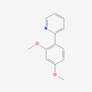 2-(2,4-Dimethoxyphenyl)pyridine - 98061-24-6