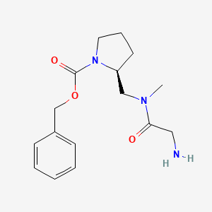 (S)-2-{[(2-Amino-acetyl)-methyl-amino]-methyl}-pyrrolidine-1-carboxylic acid benzyl ester - 1353995-05-7